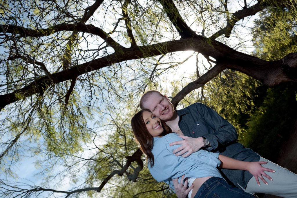 couple poses for engagement photography