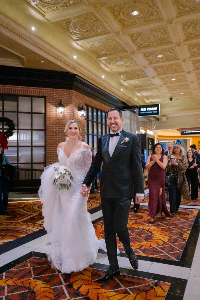 bride and groom reception entrance at Caesars Palace Las Vegas wedding candid moment photographed by Zoltan Redl Nagy