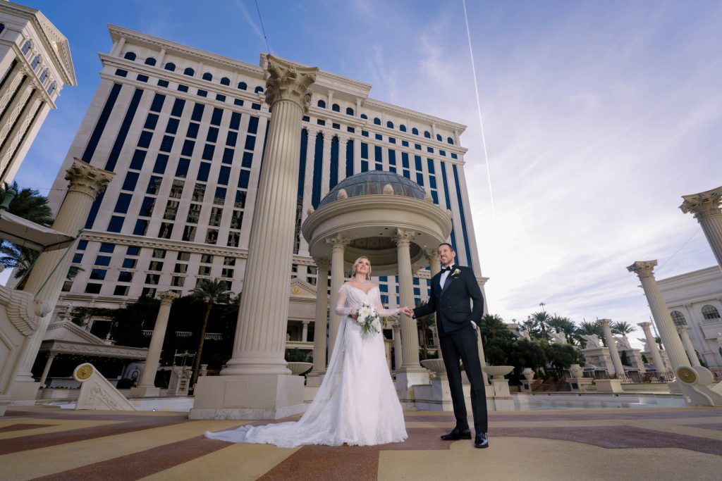 bride and groom portrait at Caesars Palace Las Vegas wedding wide angle plaza photographed by Zoltan Redl Nagy