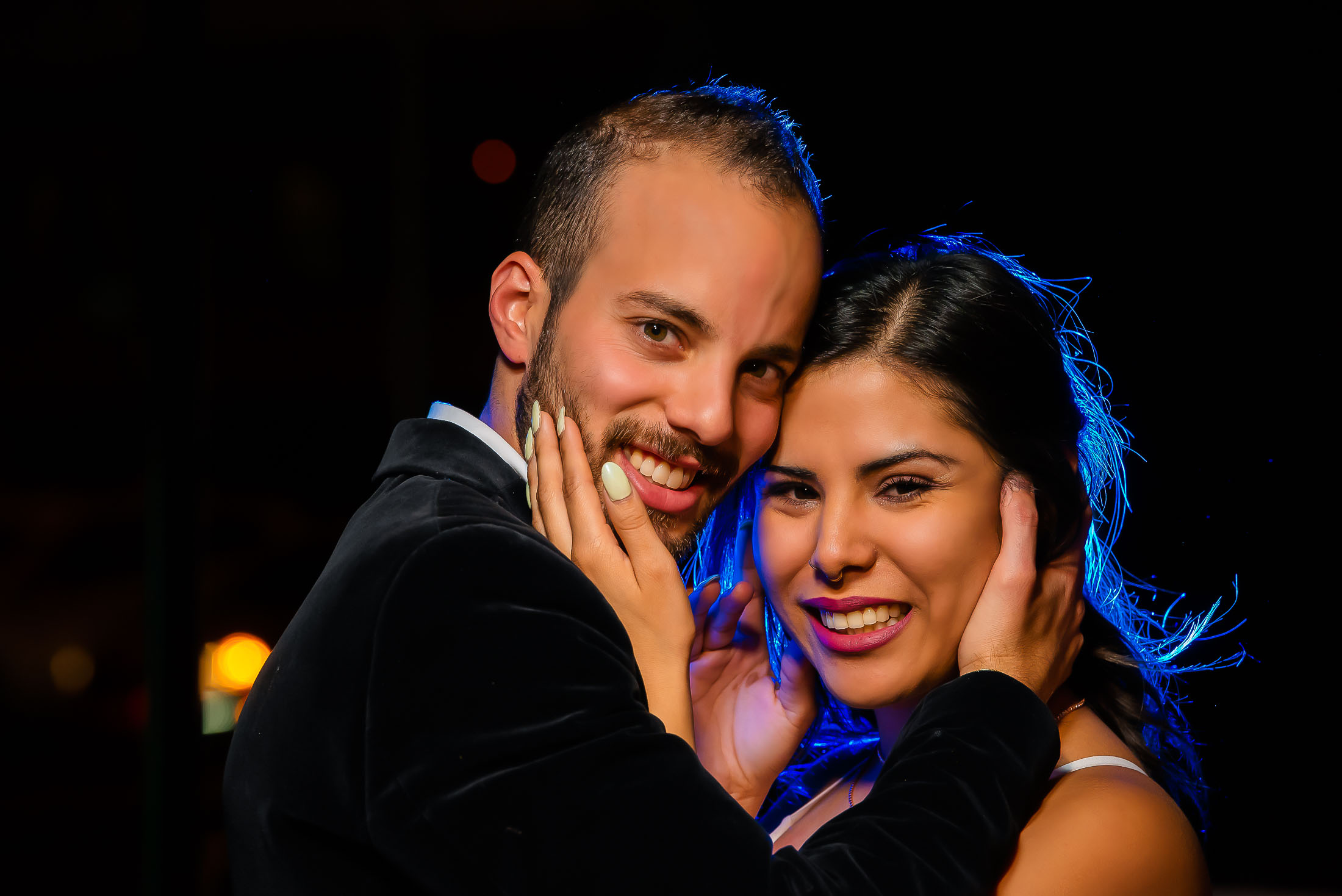 Las Vegas Strip elopement intimate couple portrait at night with dramatic lighting, photographed by Zoltan Redl-Nagy
