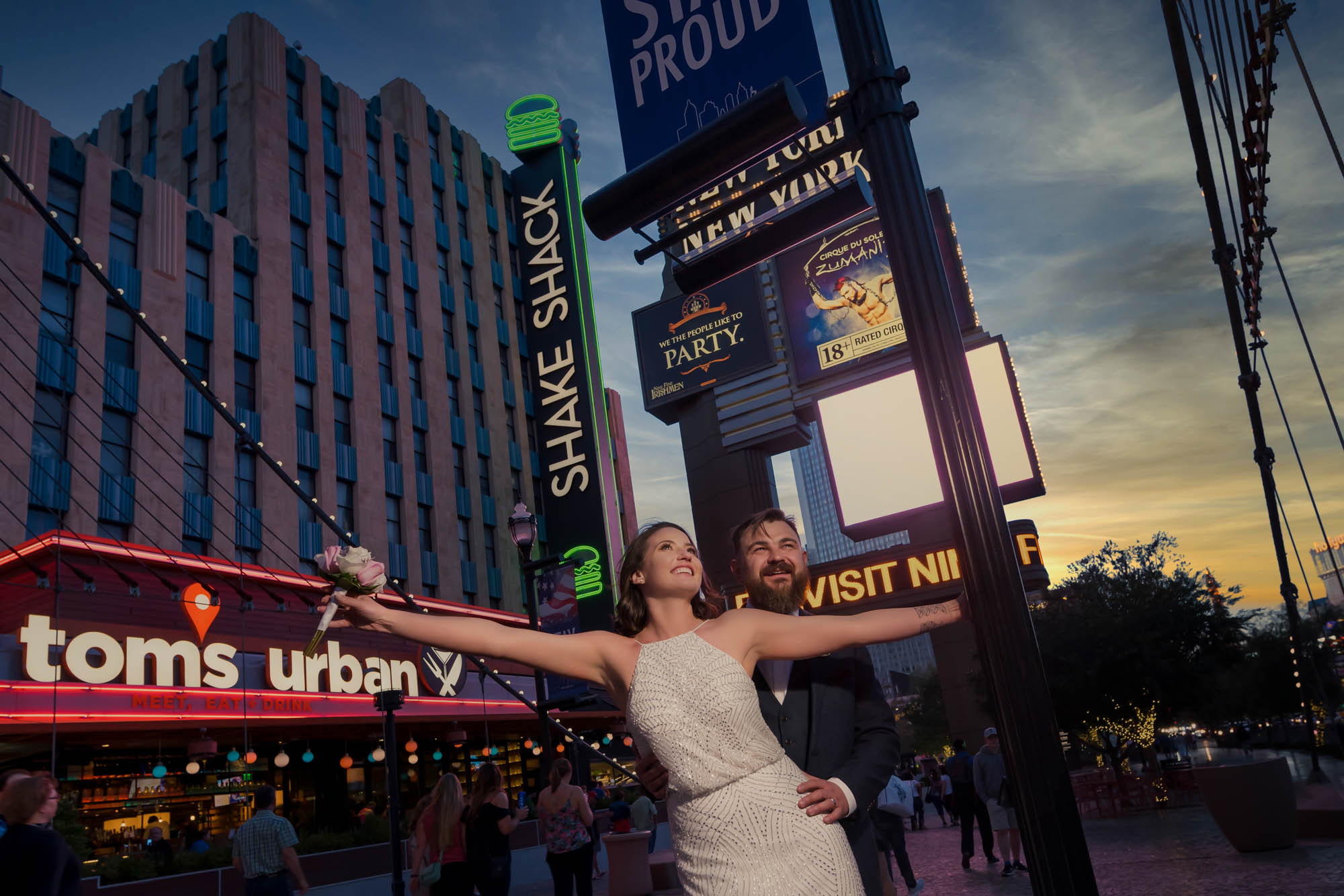 Las Vegas Strip elopement couple near Shake Shack and Toms Urban at sunset photographed by Zoltan Redl Nagy