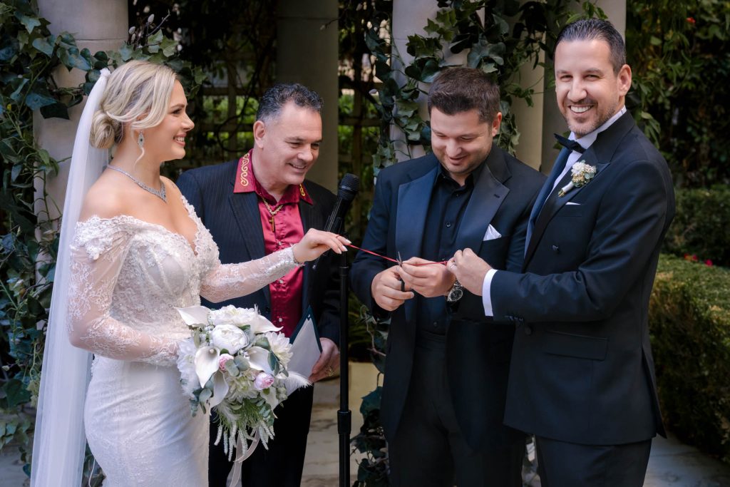Wedding ring exchange ceremony at Caesars Palace Venus Garden Las Vegas, photographed by Zoltan Redl Nagy.