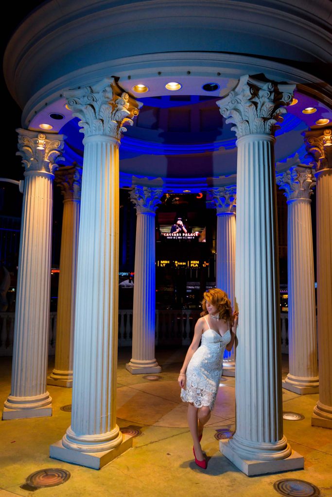 Las Vegas elopement bride editorial portrait at Caesars Palace gazebo at night with dramatic lighting, photographed by Zoltan Redl-Nagy