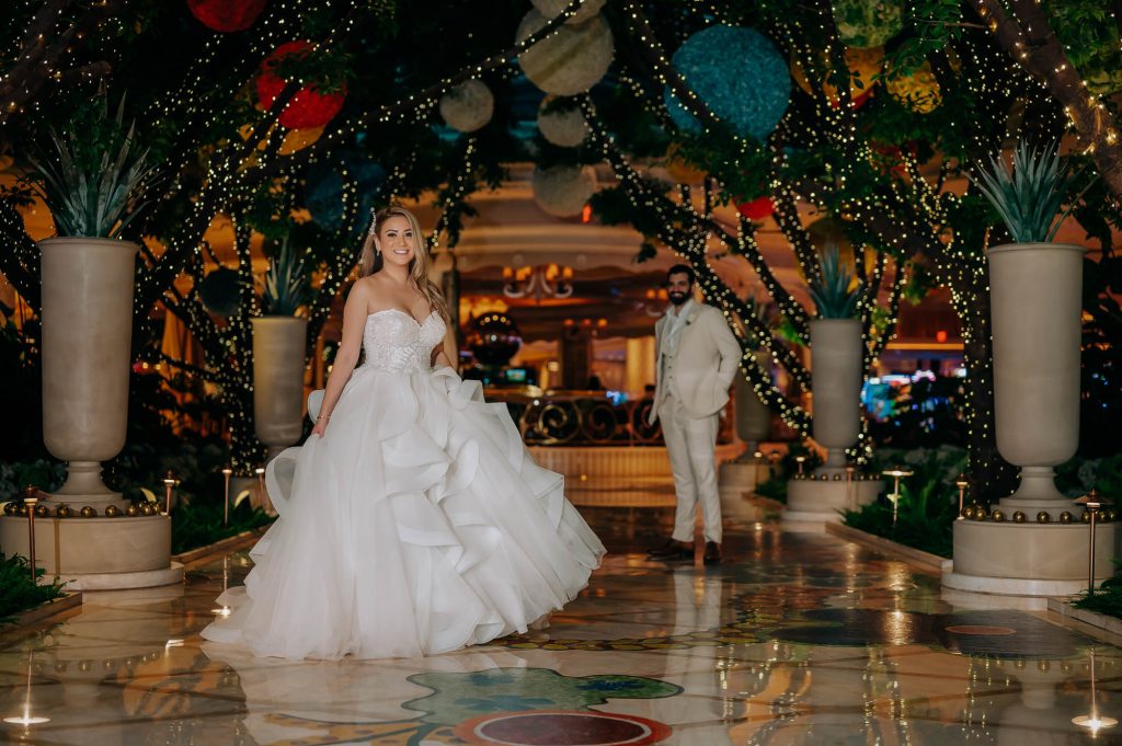 Luxury wedding couple portrait inside the beautifully decorated Wynn Las Vegas resort at night