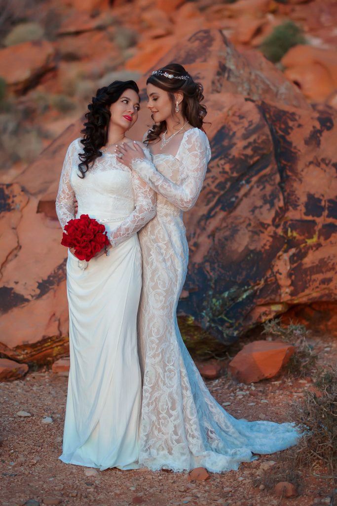 Same-sex elopement brides in Red Rock Canyon desert photographed by Zoltan Redl Nagy