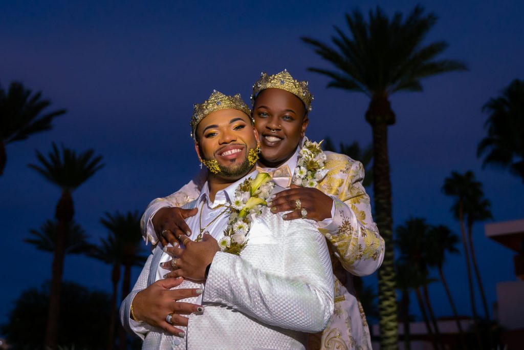 Same sex wedding couple portrait at night with palm trees at Red Rock Casino Las Vegas, photographed by Zoltan Redl Nagy.