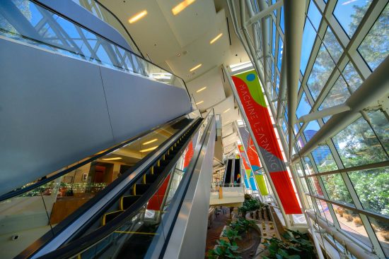 Las Vegas corporate conference venue interior at ARIA Resort with modern architecture and escalators, photographed by Zoltan Redl-Nagy