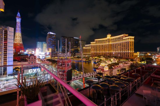 Las Vegas corporate rooftop event with Bellagio fountain view and Strip skyline at night, photographed by Zoltan Redl-Nagy