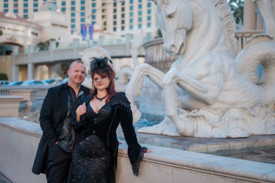 Las Vegas Strip elopement couple portrait at Caesars Palace fountain photographed by Zoltan Redl Nagy
