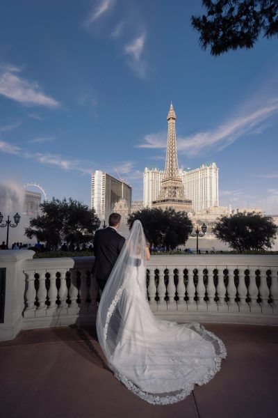 Las Vegas Strip elopement couple overlooking Paris Eiffel Tower Las Vegas photographed by Zoltan Redl Nagy
