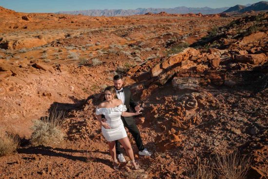 Valley of Fire desert elopement couple portrait in red rock landscape Nevada photographed by Zoltan Redl Nagy