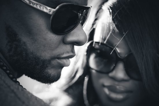 Engagement couple wearing sunglasses close up black and white intimate moment photographed by Zoltan Redl Nagy