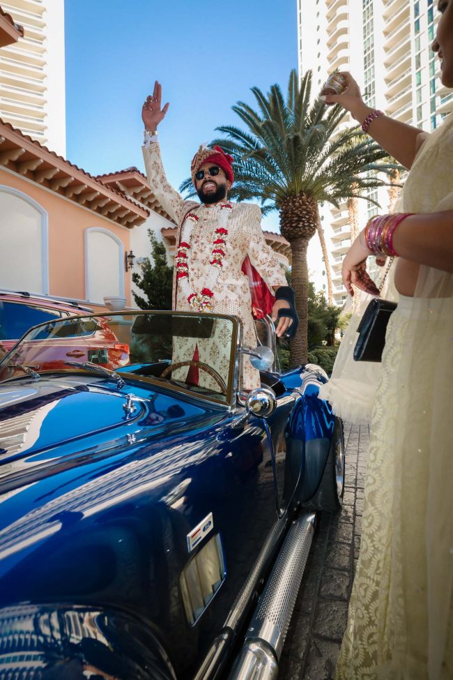 indian groom baraat arrival vintage car stirling club las vegas wedding