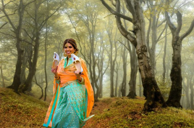 indian wedding bridesmaid portrait in traditional attire outdoor forest setting