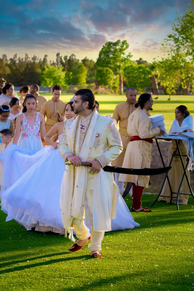 indian wedding groom ceremony with ceremonial sword at Casa de Shenandoah Las Vegas