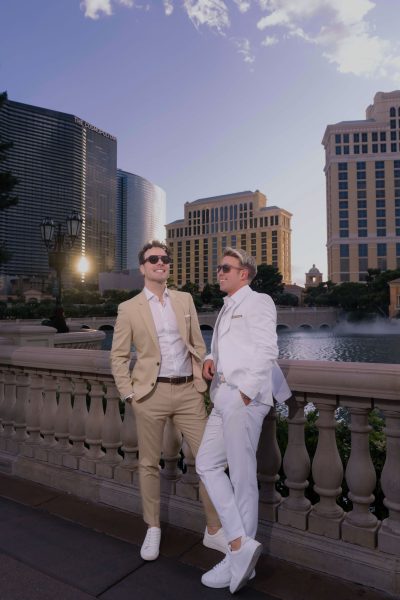 Couple portrait at Bellagio fountains with Las Vegas Strip skyline