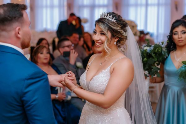 Bride and groom exchanging rings during Las Vegas wedding ceremony indoor