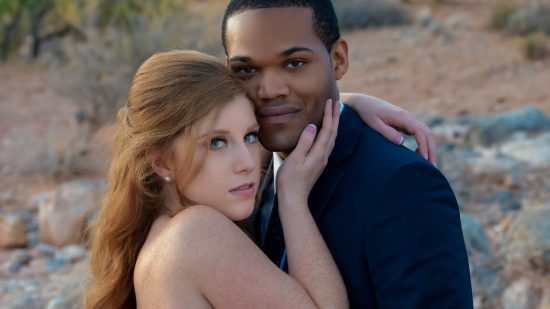 Bride and groom sharing an intimate Red Rock Canyon elopement portrait featured on the homepage of Las Vegas Wedding Photographer Zoltan Redl-Nagy