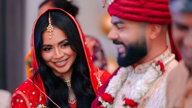 Las Vegas Wedding Photographer capturing a joyful Indian bride during a traditional Hindu wedding ceremony.