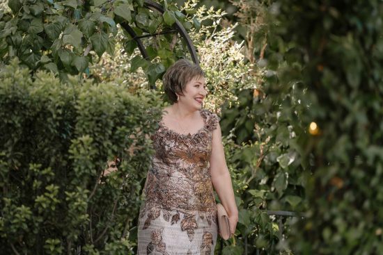 Mother of the bride arriving at an Armenian wedding ceremony at Lakeside Weddings & Events in Las Vegasceremony at The Grove Las Vegas