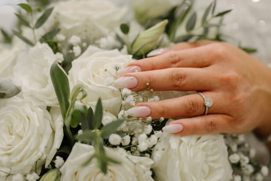 Bride's engagement ring on a bridal bouquet before an Armenian wedding in Las Vegas