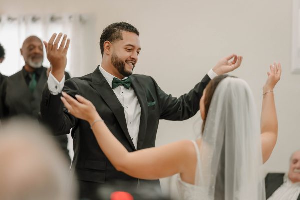 Bride and groom performing a traditional Armenian wedding dance in Las Vegas