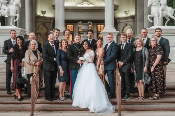 Large family group portrait at Caesars Palace during a Las Vegas wedding ceremony.