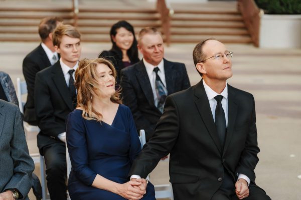 The groom's parents watching the outdoor wedding ceremony at Caesars Palace in Las Vegas.