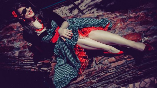 Las Vegas Wedding Photographer capturing a creative fashion-inspired engagement portrait with dramatic lighting.