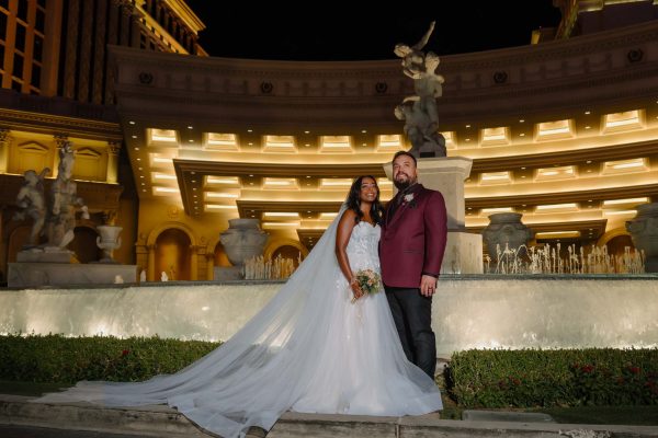 Bride and groom during the early morning blue hour at Caesars Palace in Las Vegas.