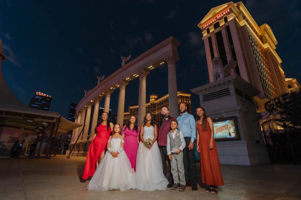 Family wedding portrait during early morning blue hour at Caesars Palace Las Vegas
