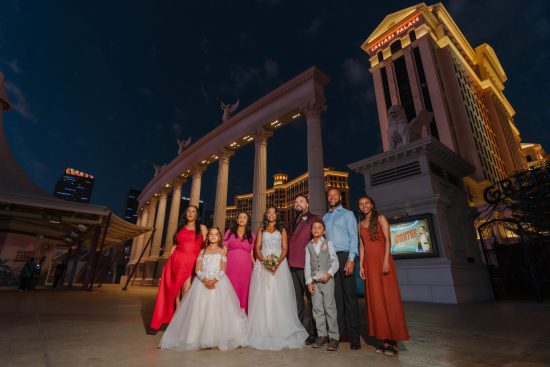 Family wedding portrait during early morning blue hour at Caesars Palace Las Vegas